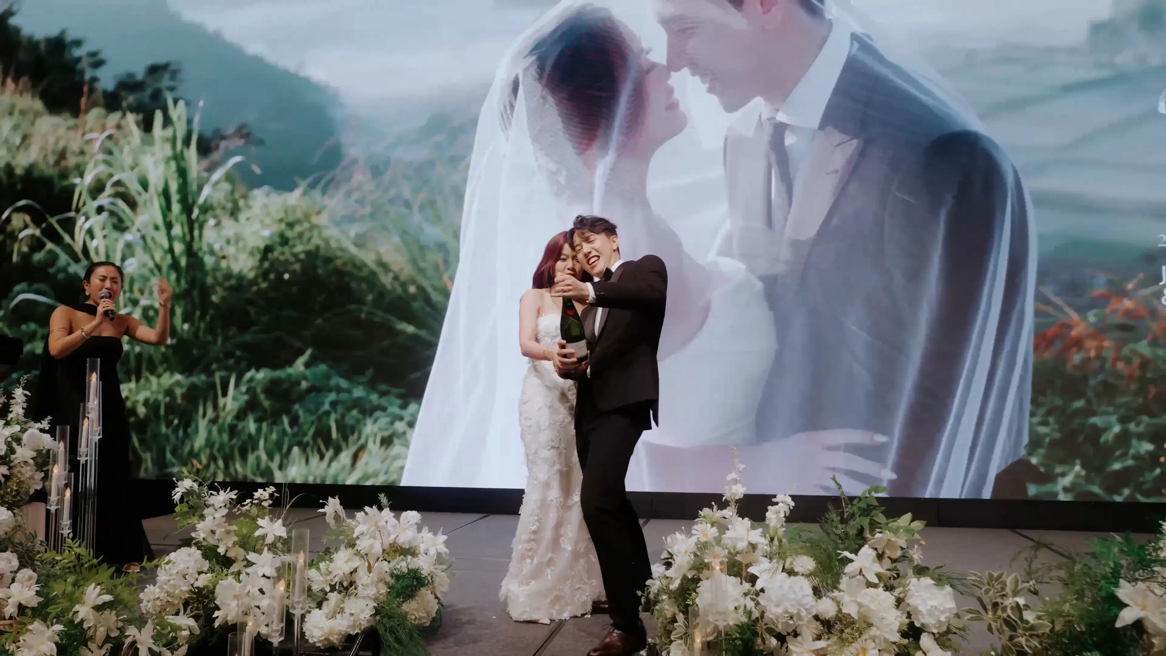 Bride and groom champagne popping at W Singapore - Sentosa Cove