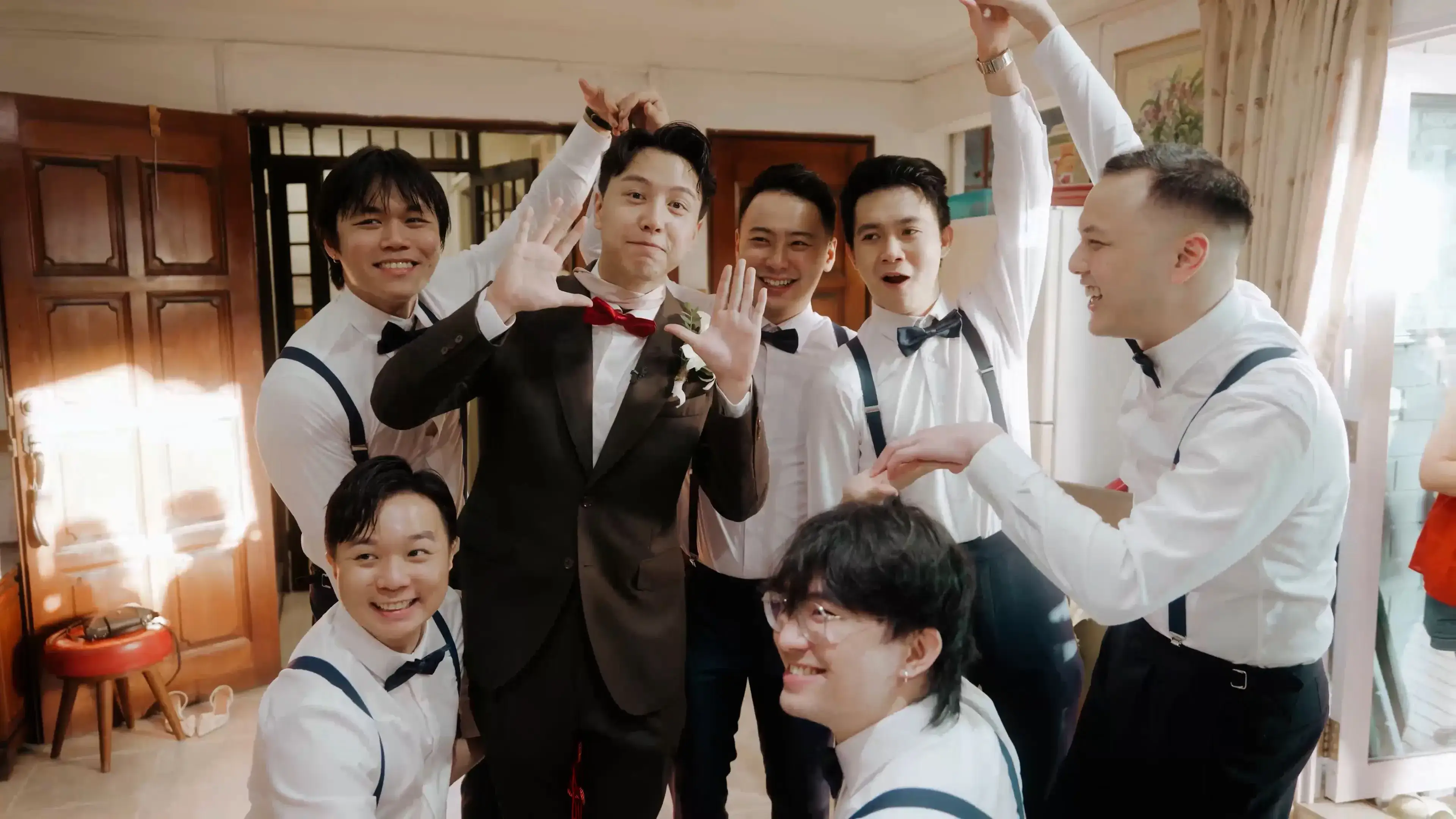 Groom taking part in gatecrash games in Singapore