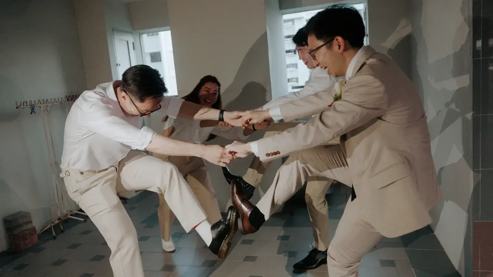 Daron and his groomsmen during the wedding gatecrash at home