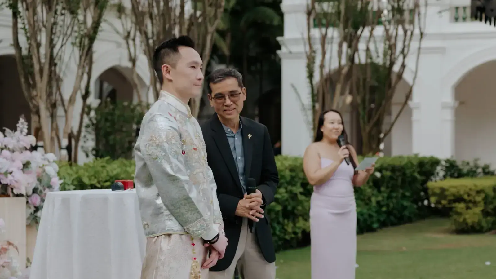 Groom waiting for the bride to arrive at Raffles Hotel Lawn
