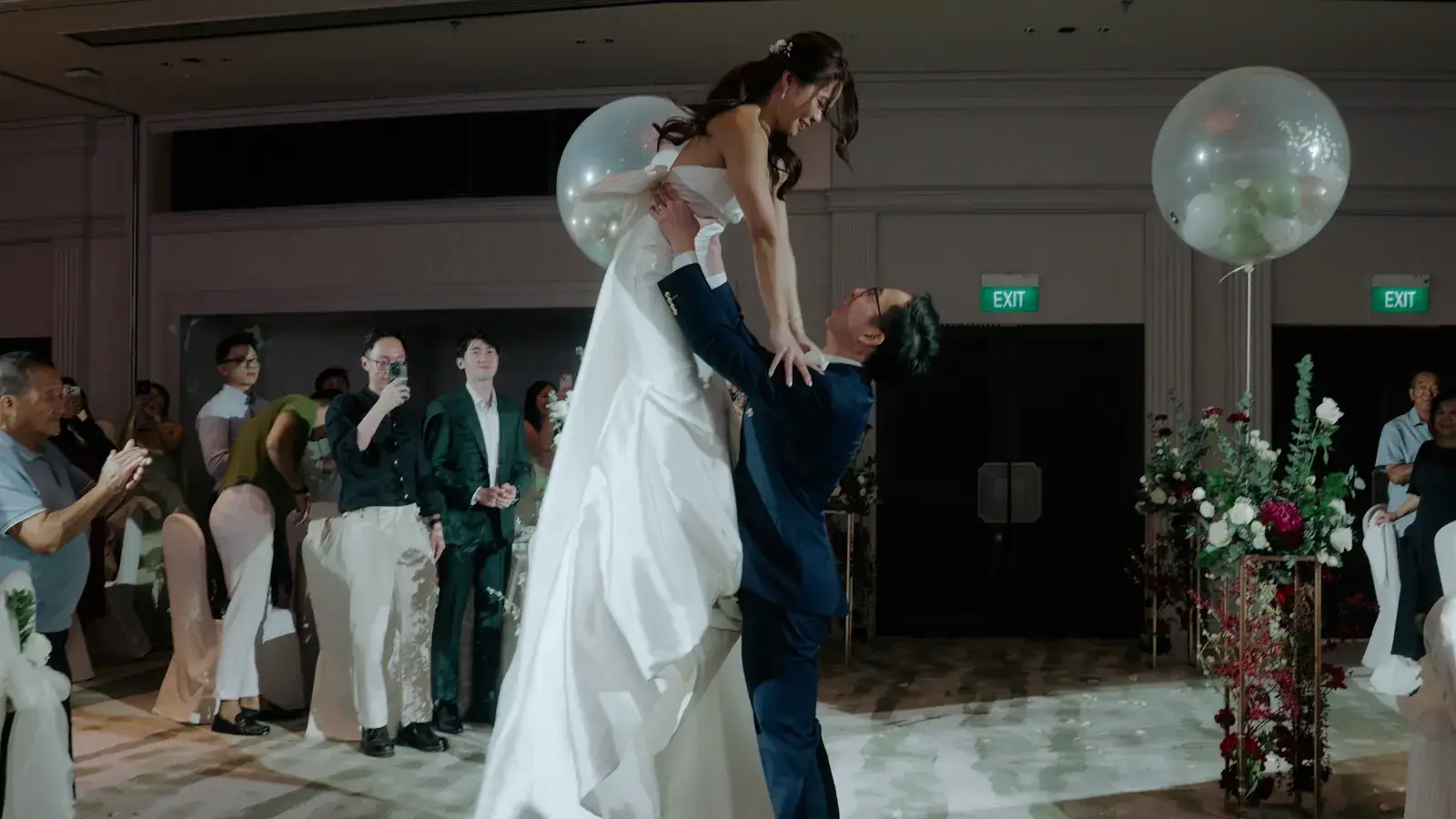 Daron and Celine marching in during the Mandarin Oriental Singapore wedding celebrations
