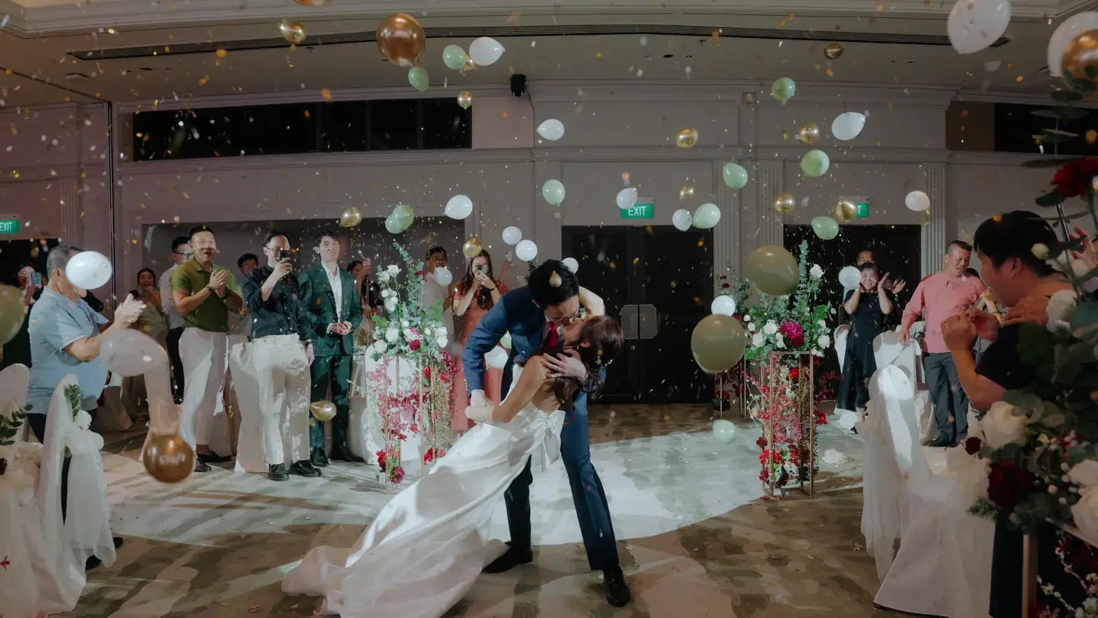 Daron and Celine marching in during the Mandarin Oriental Singapore wedding celebrations