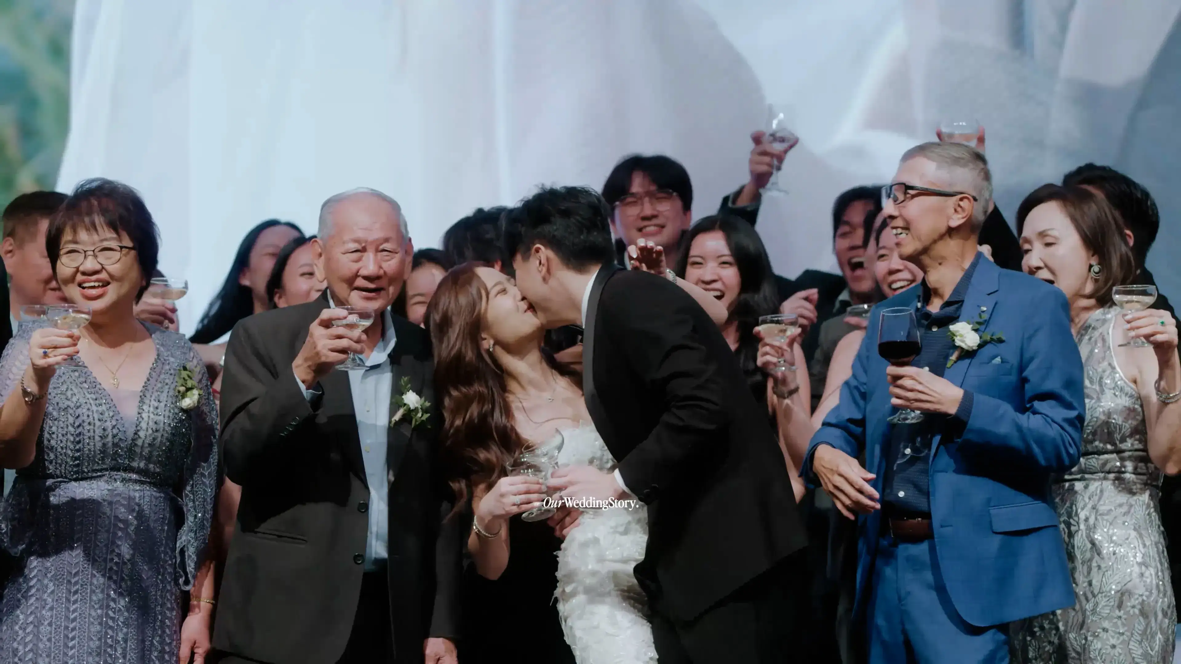 Champagne toast with bride, groom, and family at W Singapore - Sentosa Cove